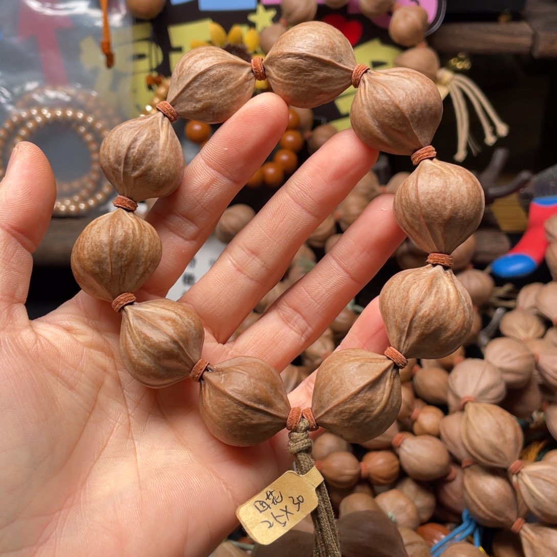 x***1橄榄核吊坠2530四花铁核