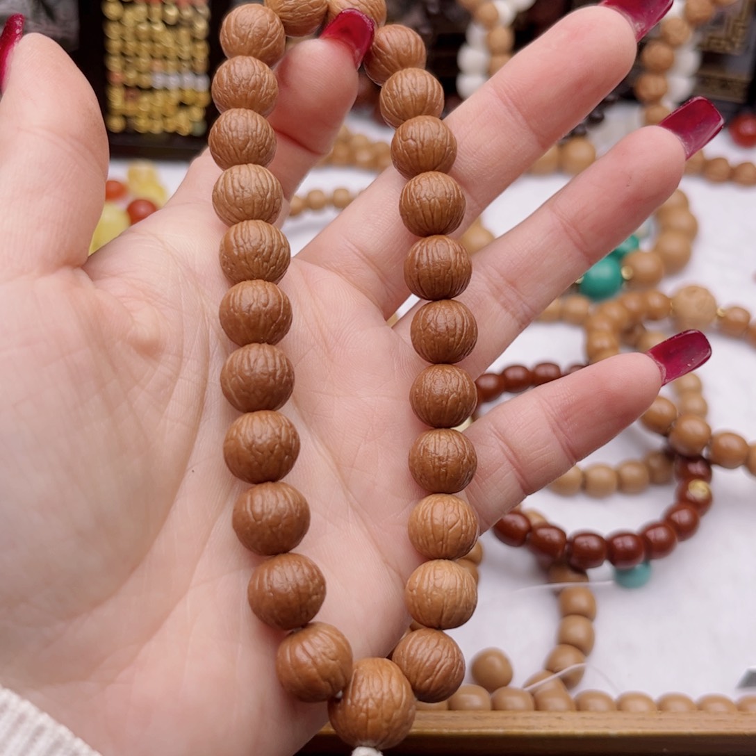 猴头核桃手串贰**肆凤羽