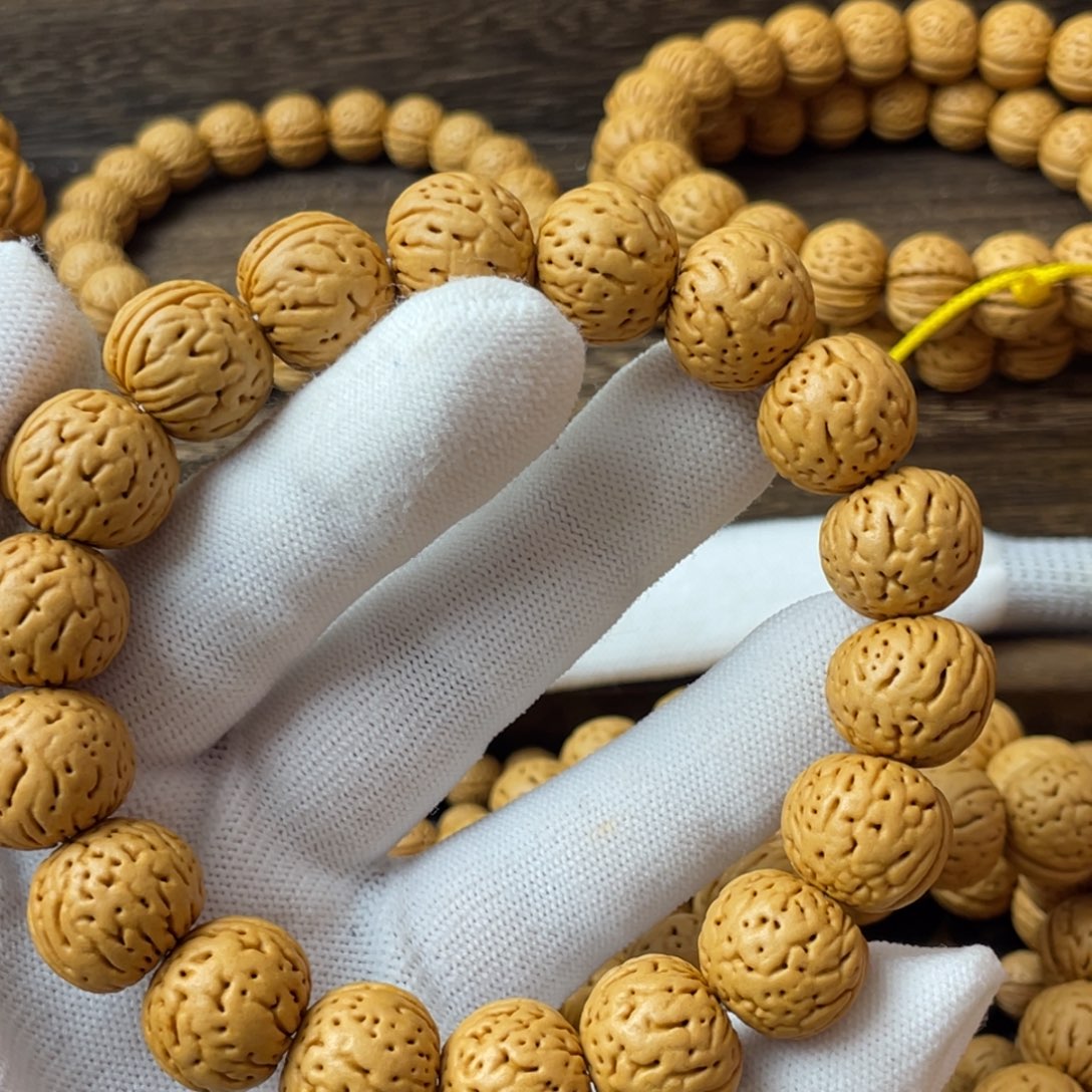 吊坠桃核张*疯金丹手串