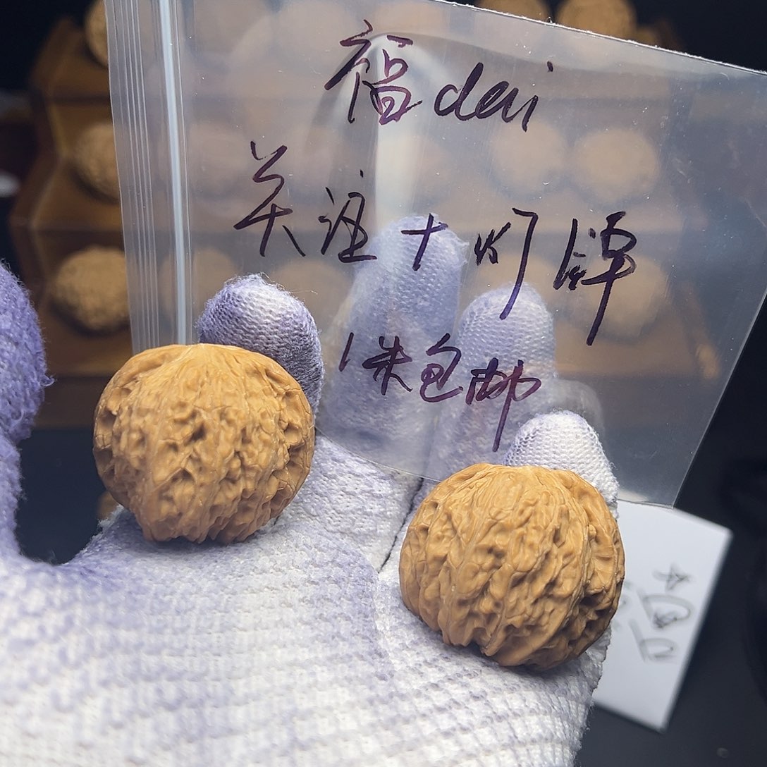 家***。文玩核桃把件福袋