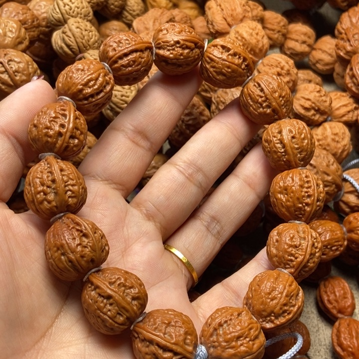 文玩核桃吊坠小瓜子手串