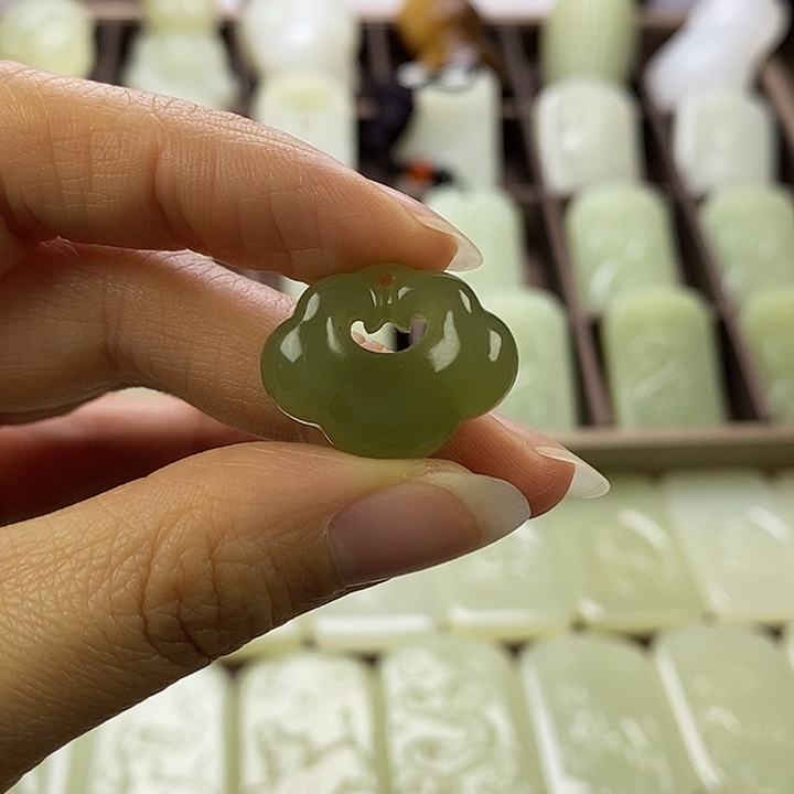 昆仑石倔****人双面如意锁