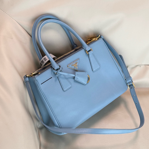 95新 Prada/普拉达 天蓝色杀手手提斜挎包063323底长28