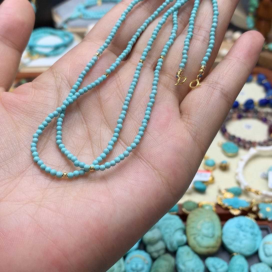 绿松石18K金镶嵌颈饰E****。