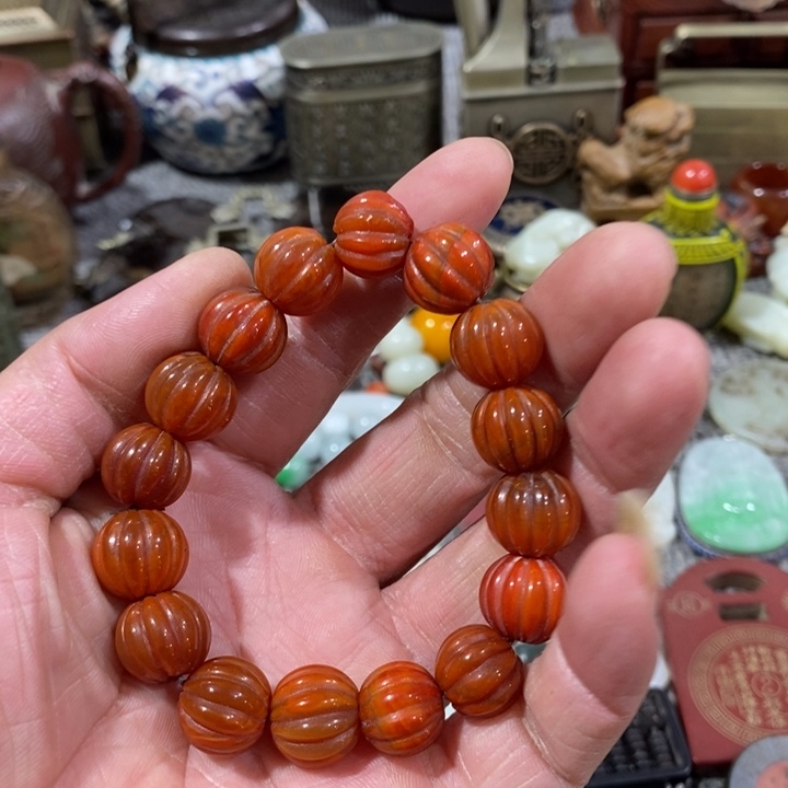 何***来石材手串。          