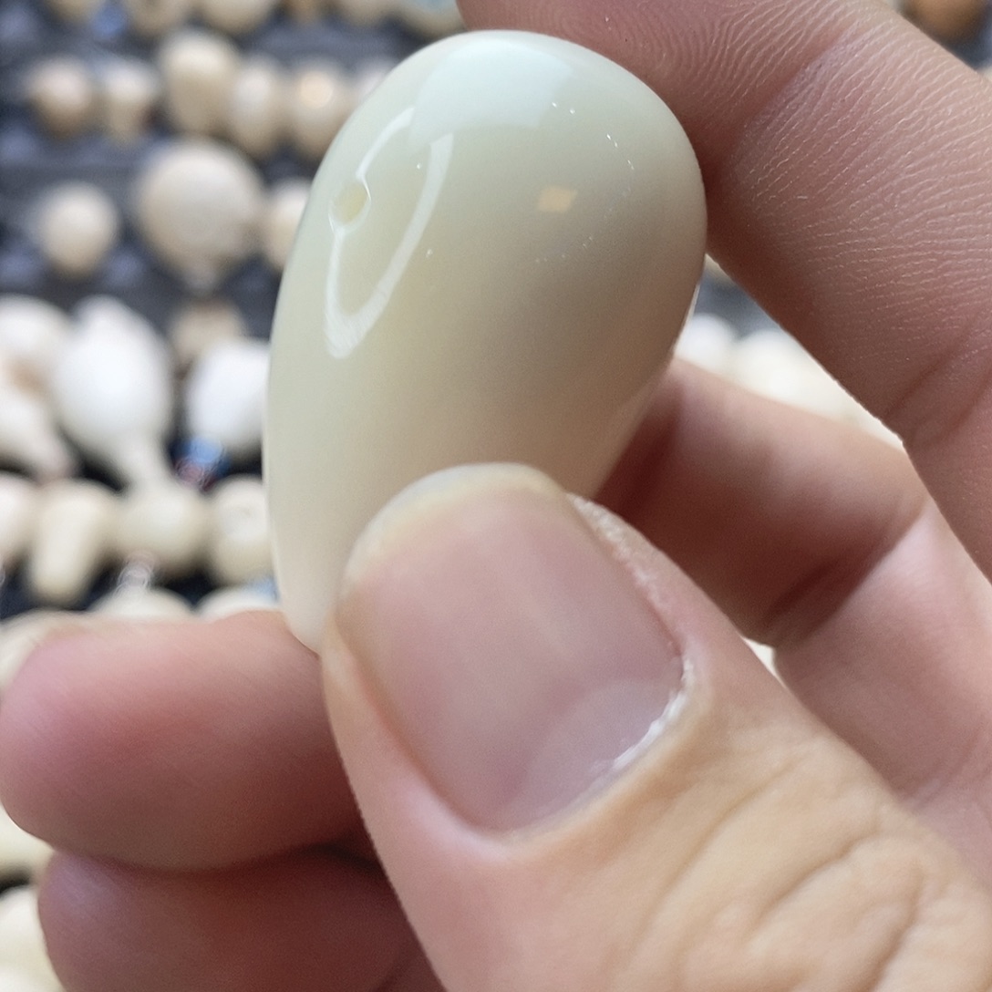 刘***火吊坠菩提根/象牙果