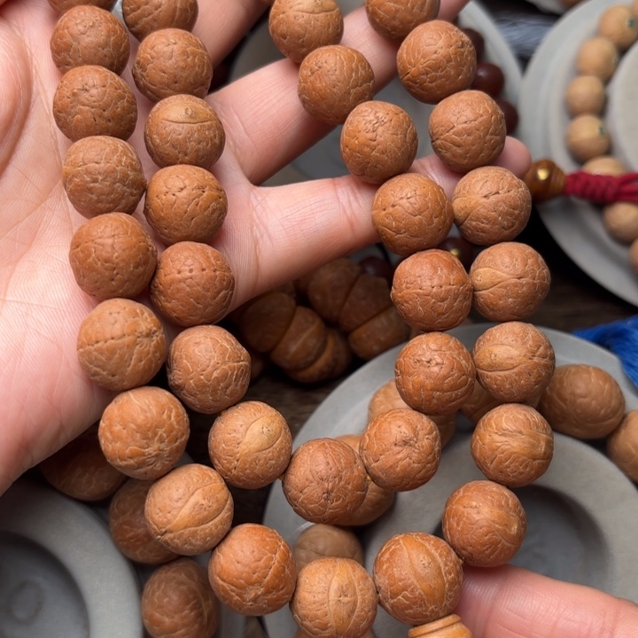 凤眼菩提吊坠14.5m m手持