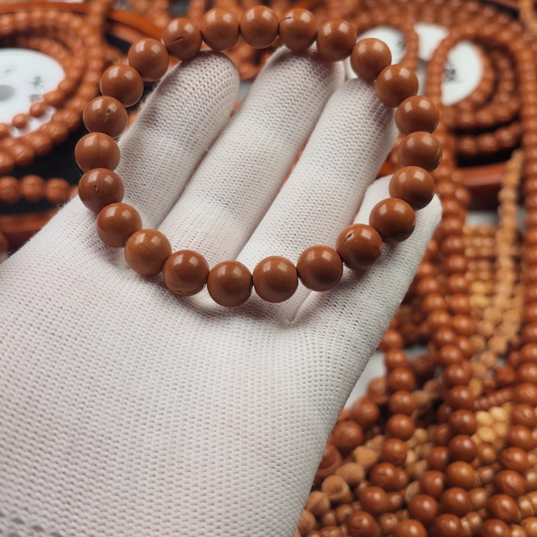 桃核吊坠好***牛一物一图