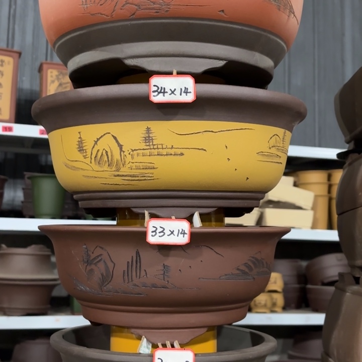 紫砂花盆100-4。         