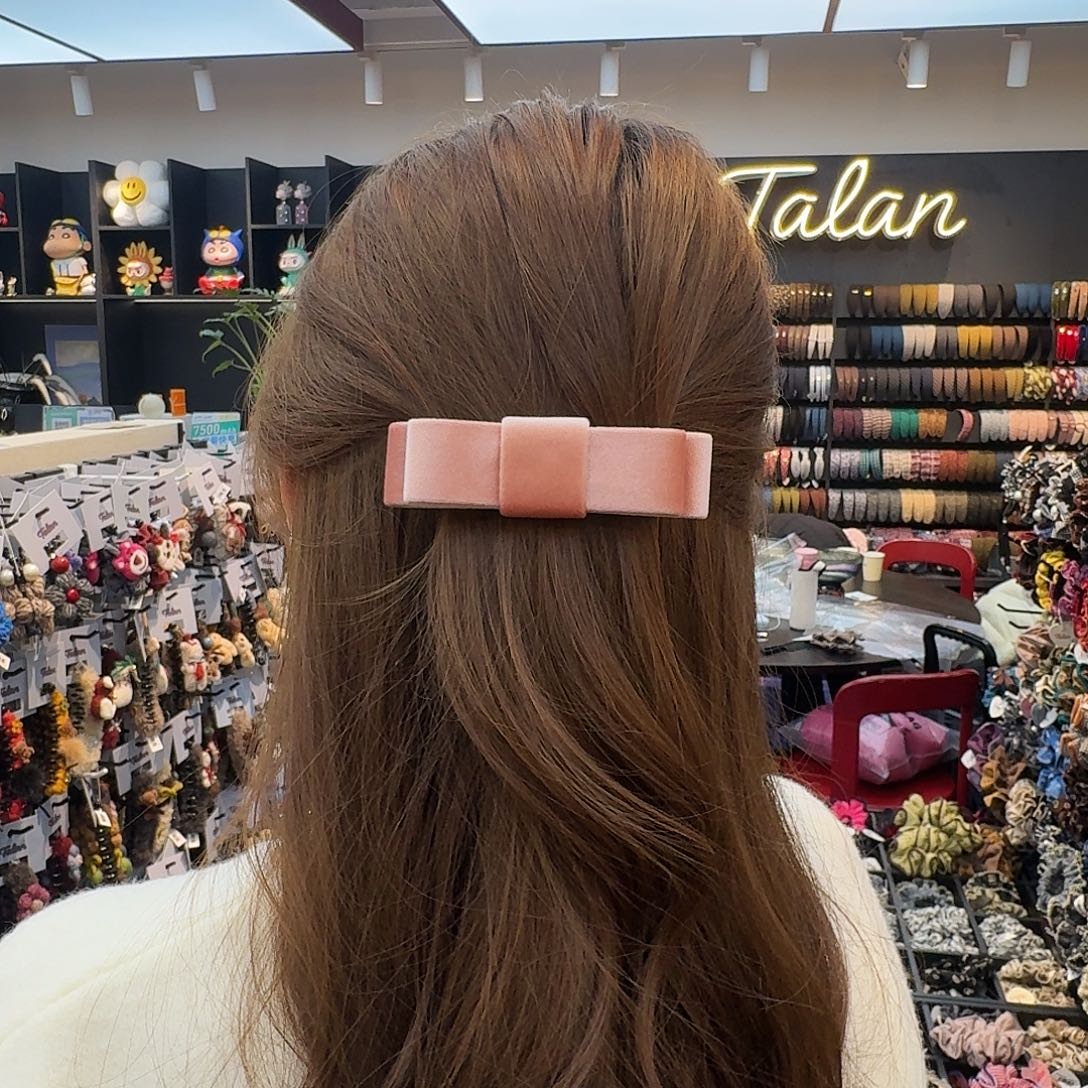 非金属粉色丝绒蝴蝶结弹簧夹