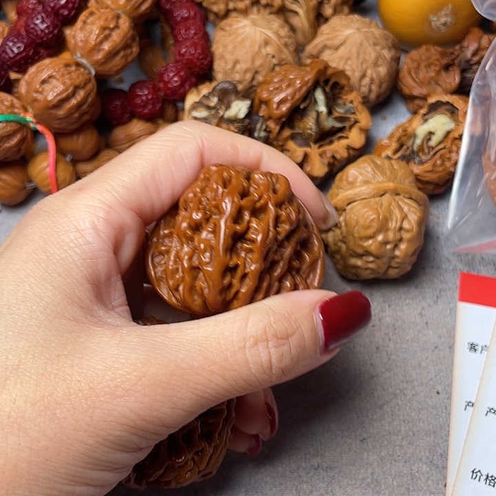 張***華文玩核桃吊坠四座楼