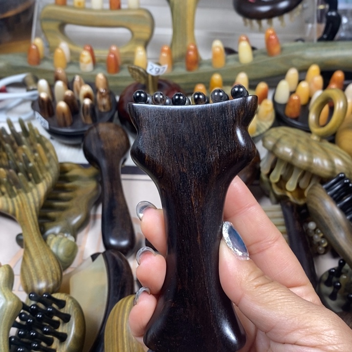 紫光檀羊尊按摩梳微瑕疵