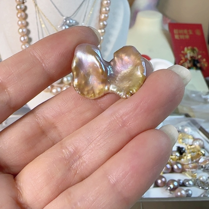 淡水珍珠巴洛克有生长纹裸珠未镶嵌火****?