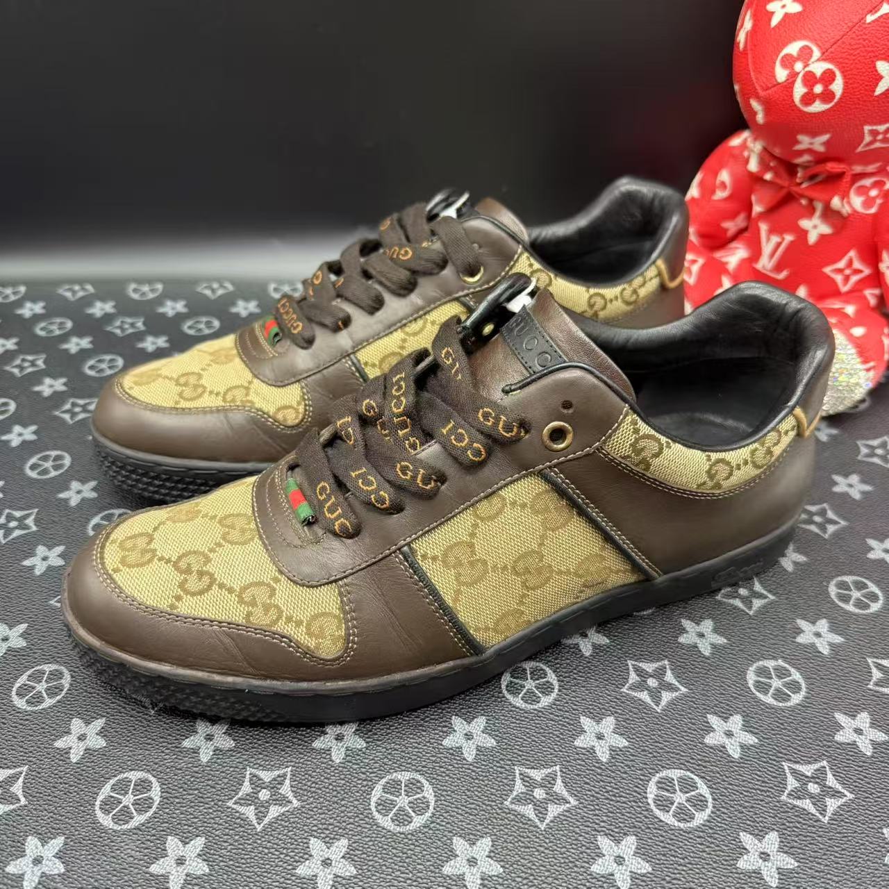 95新 GUCCI/古驰 男士棕老花满印板鞋40.5欧码 ddm2760