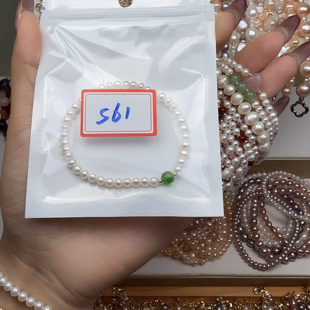 水***人淡水珍珠钛钢手绳