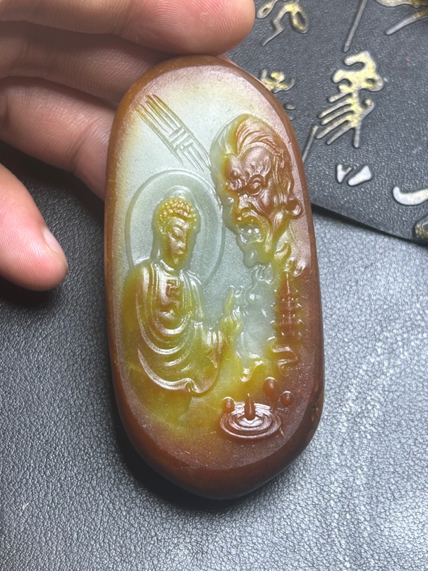 和田玉佛魔一念手把件