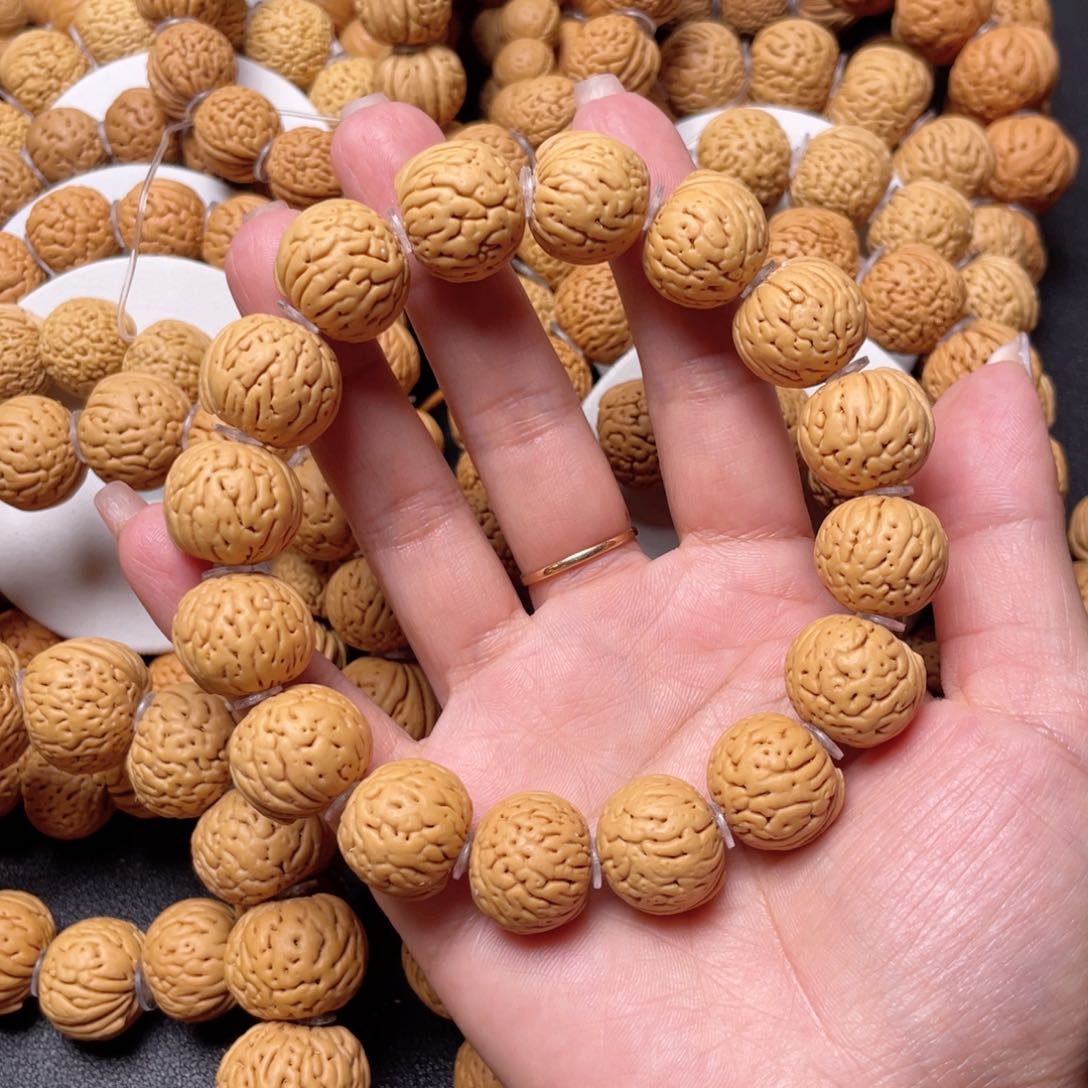 桃核手串亮*肉纹元宝