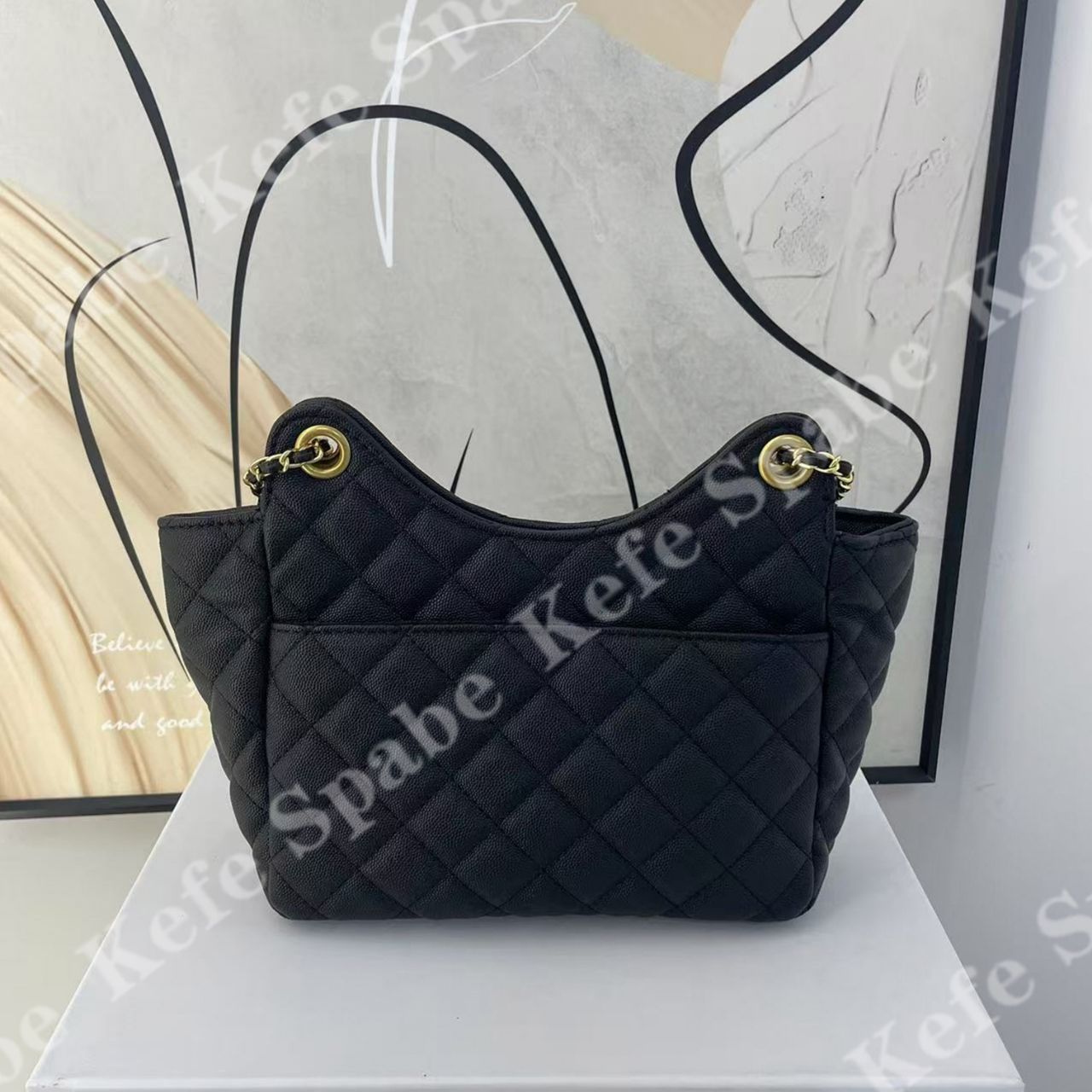 HM196   25新款黑色鱼子酱天猫精灵单肩斜挎包