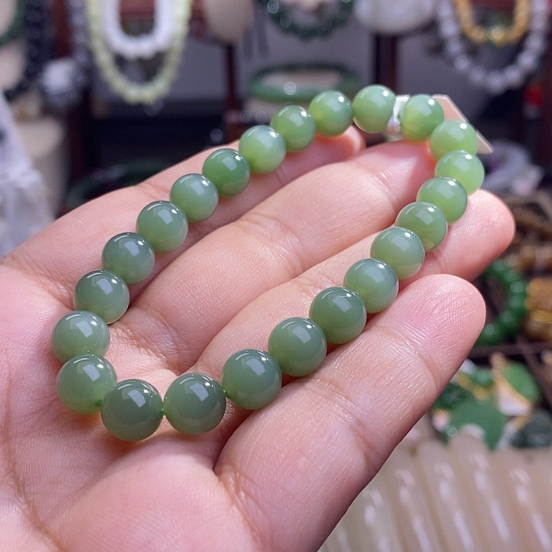 和田玉精品碧玉阳绿高冰猫眼圆珠手串8m未镶嵌欢**?
