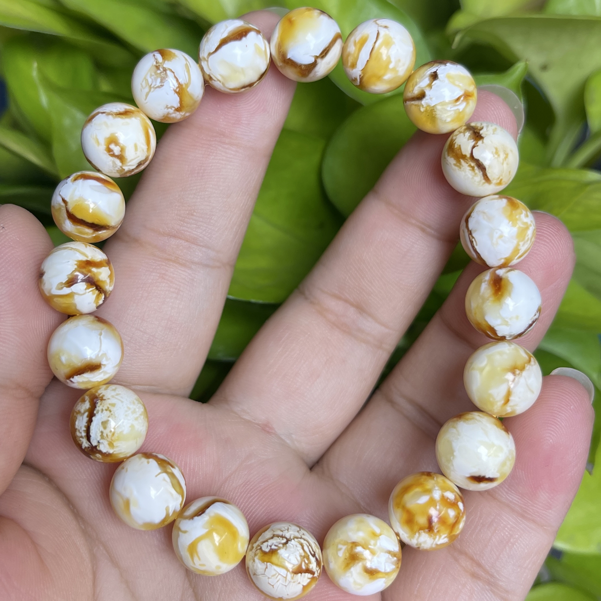 10瓷白沁色蜜蜡圆珠手串