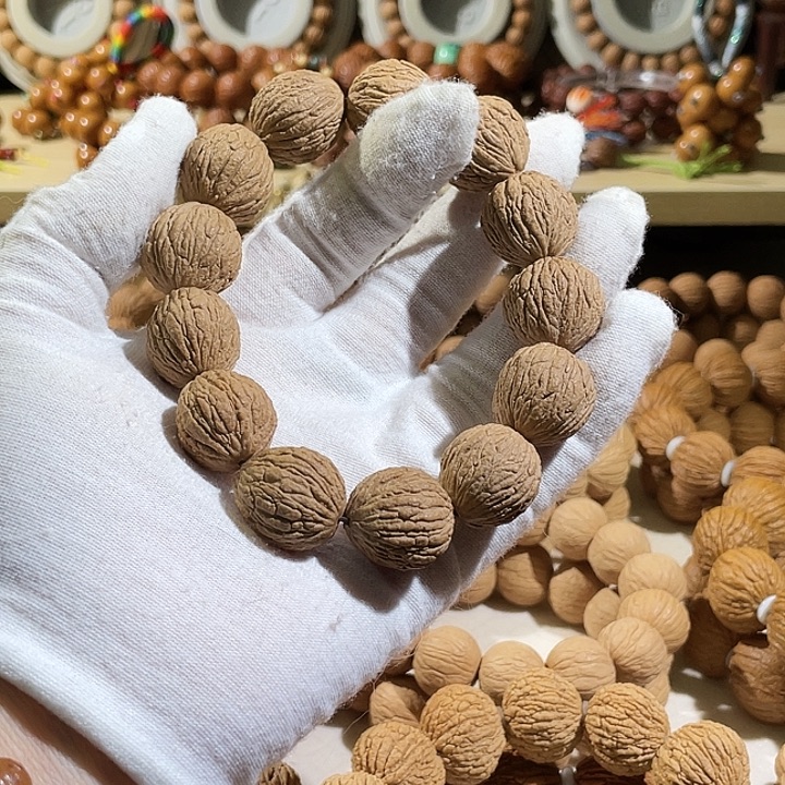 鱼***乐猴头核桃手串野生黑武士金丝凤羽