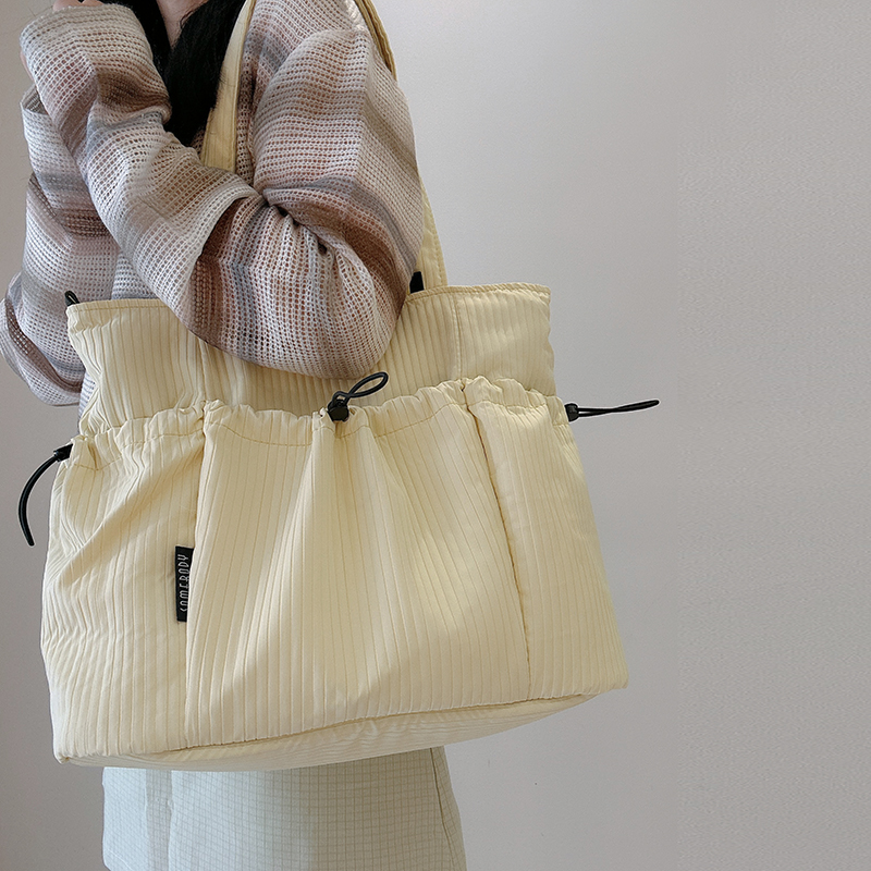 三色补丁三宅风托特包女中性风新款百搭单肩包通勤简约小众手提包