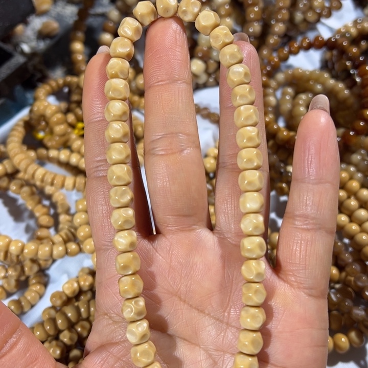 羽***绒吊坠龙脊菩提无相手持卡7.8