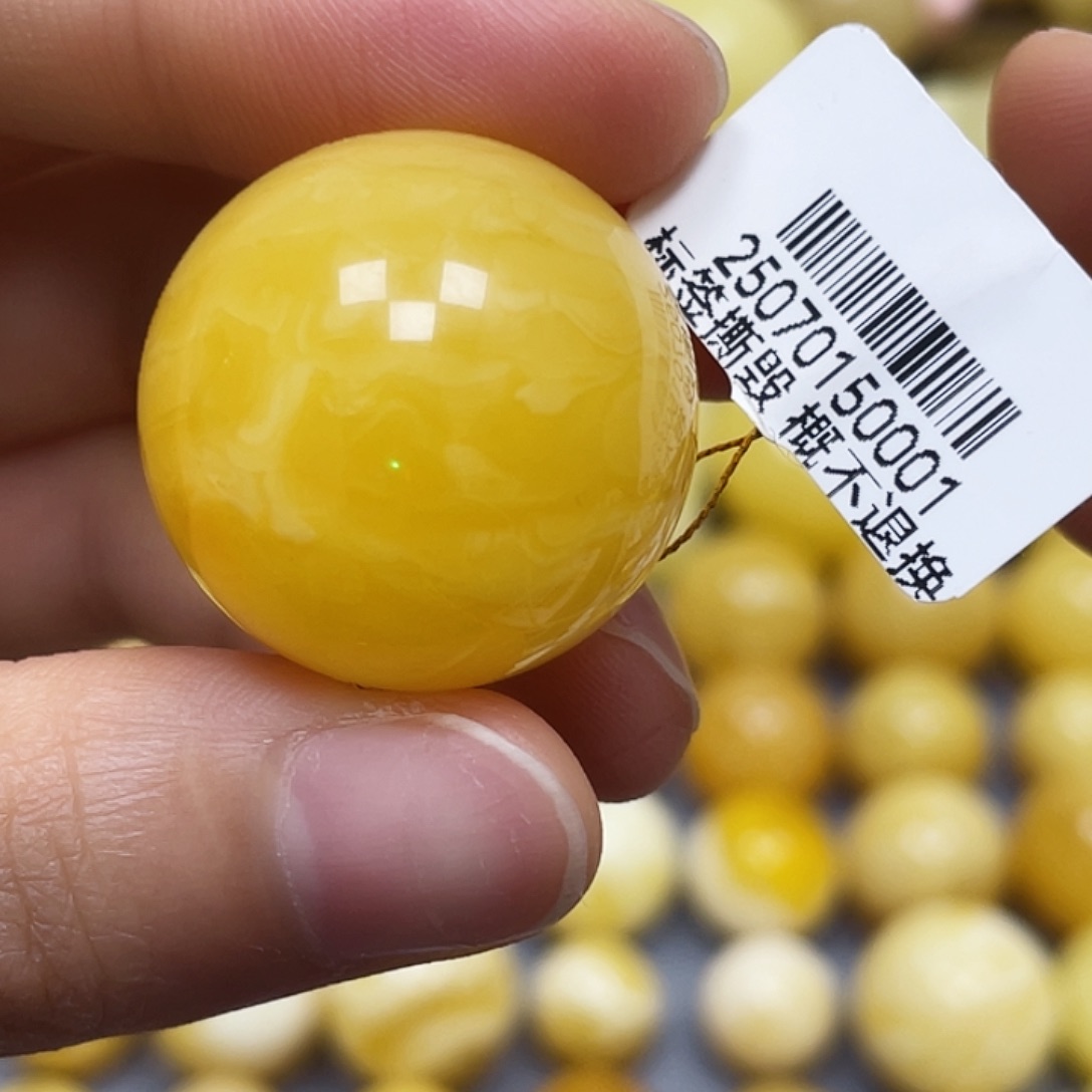 蜜蜡未镶嵌裸石25.3mm.瑕