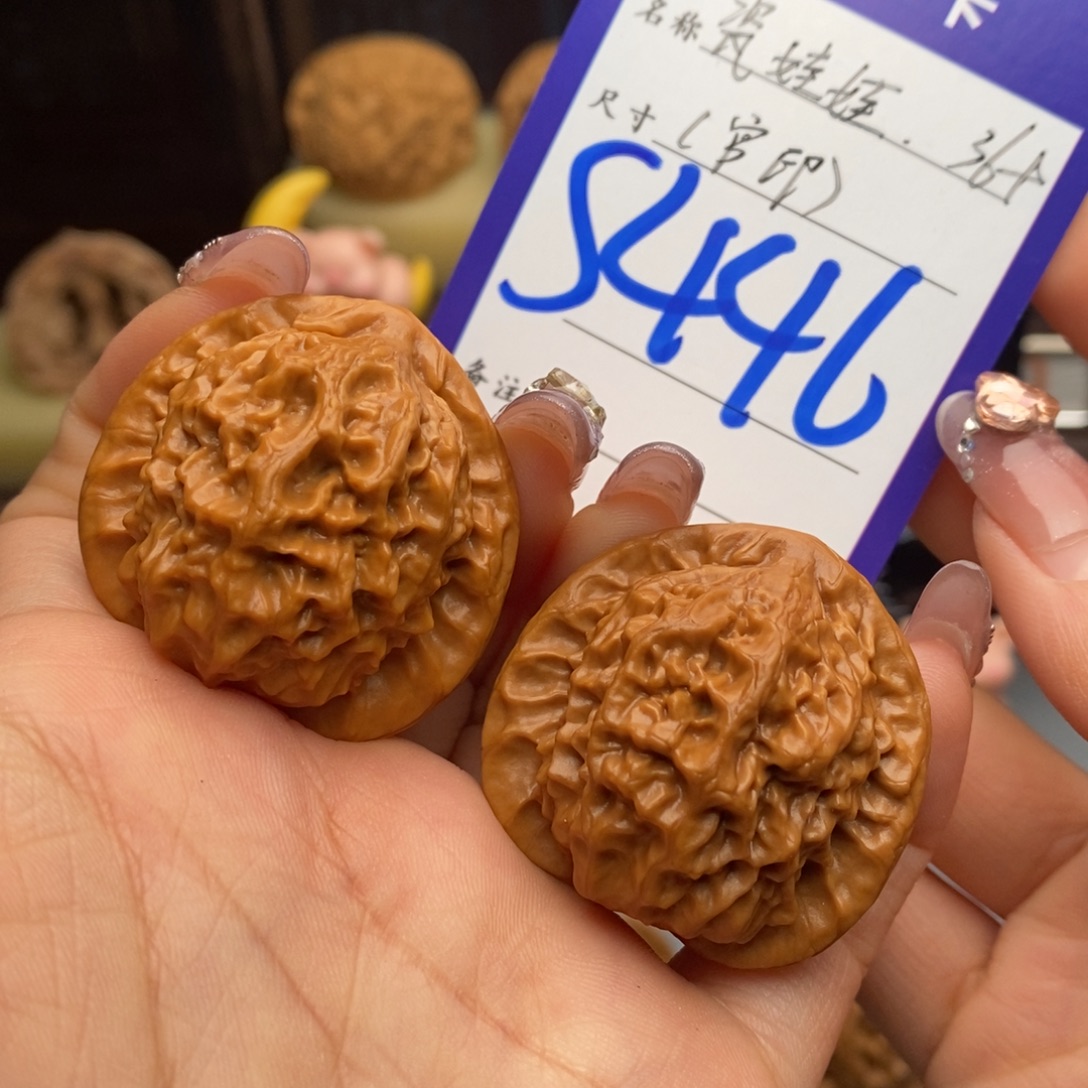 文玩核桃吊坠瓷娃娃