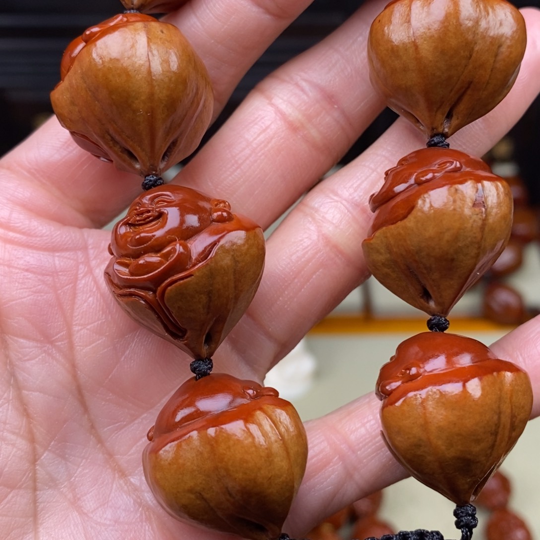 强***吊坠橄榄核包一弥勒