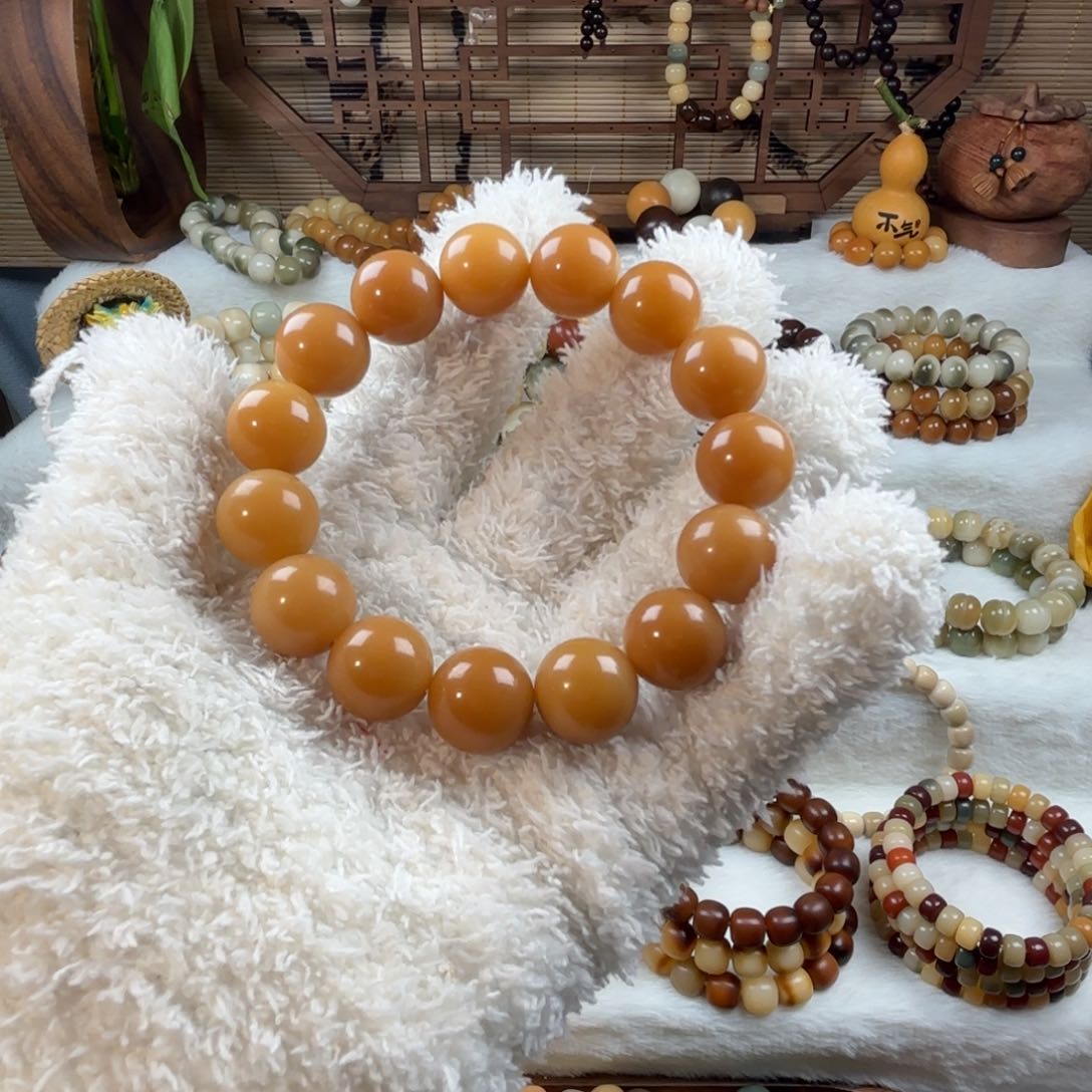 菩提根/象牙果手串1***风化黄圆珠