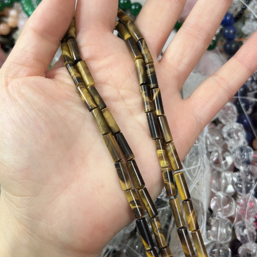 玛瑙/玉髓未镶嵌珠宝半成品，卡4x13黄虎长圆管一条