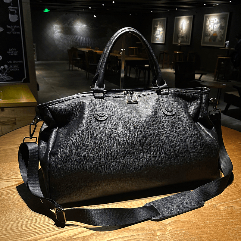 男士真皮旅行包头层牛皮手提单肩斜挎包大容量商务出差短途登机包