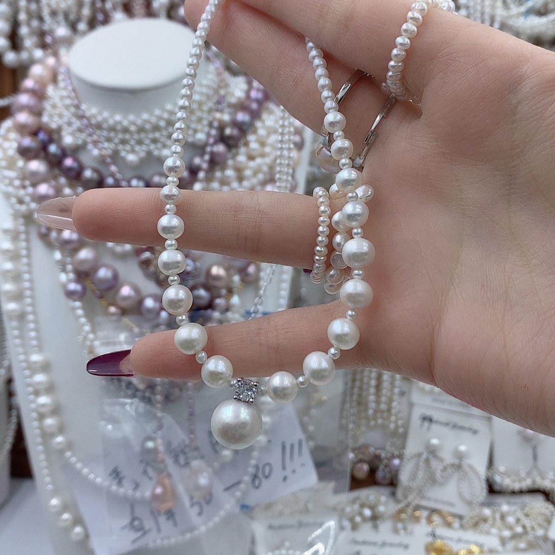 冯***澄耳饰银S925镶嵌淡水珍珠