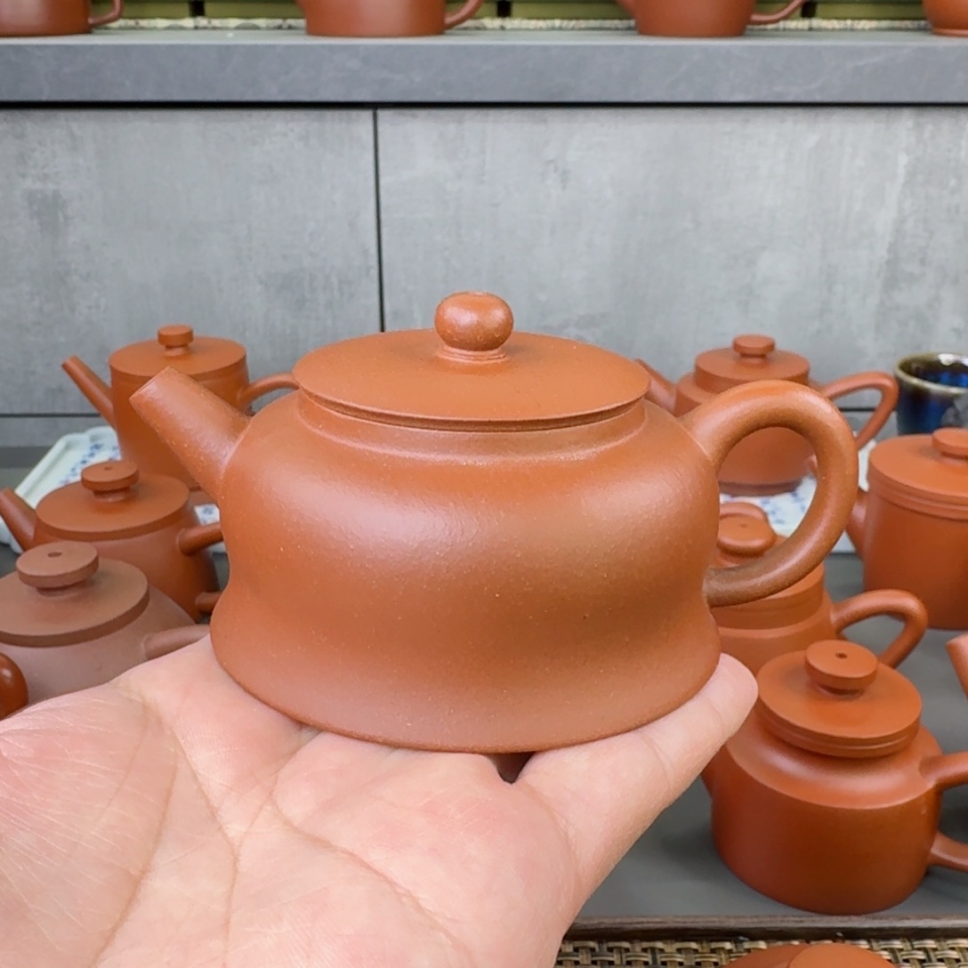 紫砂茶壶微瑕红降坡曲钟