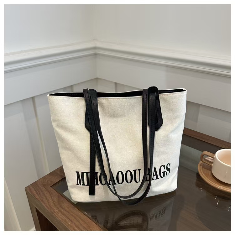 帆布包包女大容量2025新款日系布包单肩包大学生上课通勤包托特包