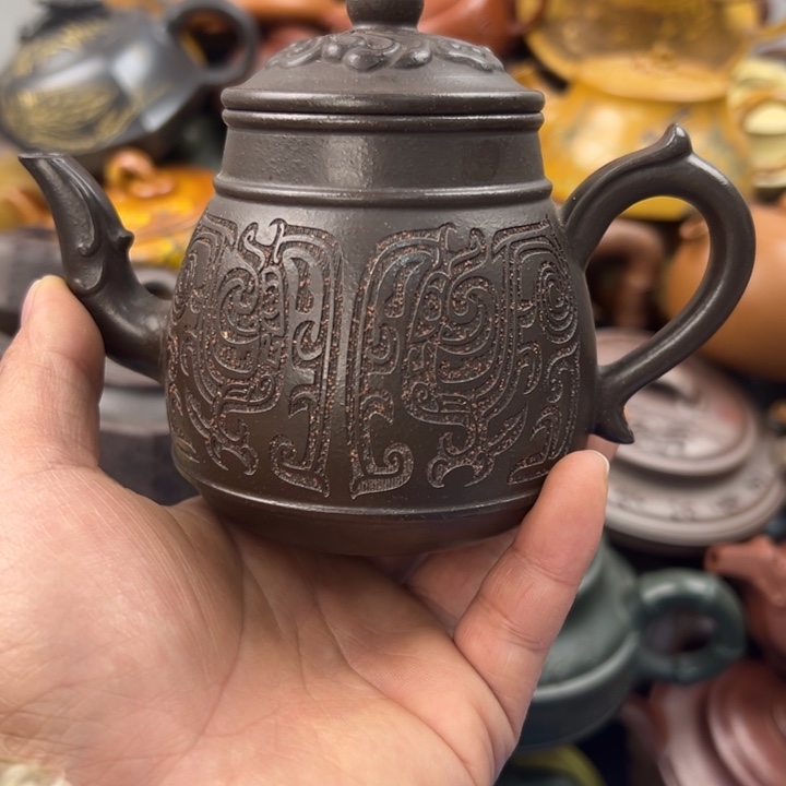 紫砂茶壶嘴巴磕碰