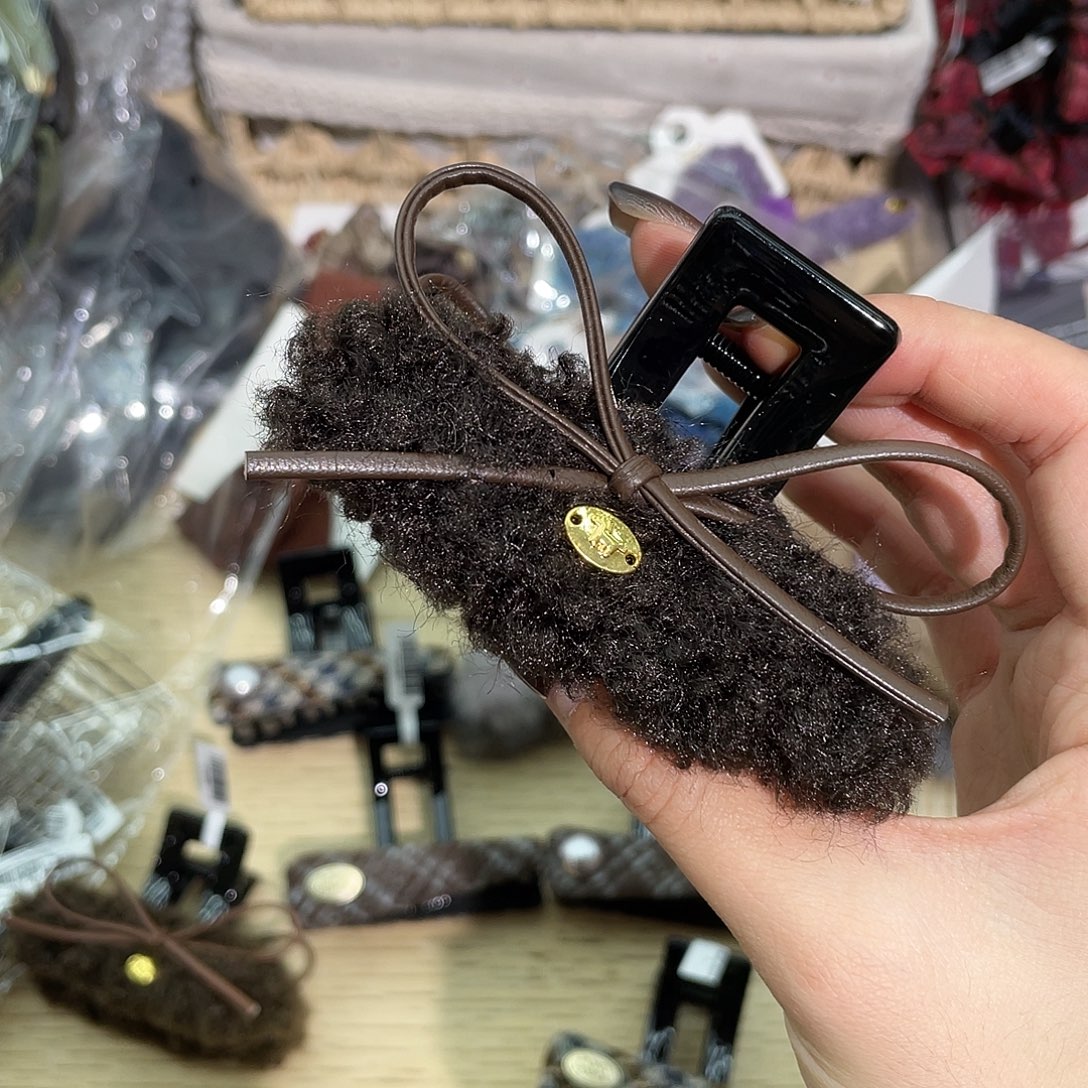 羽毛非金属深咖蝴蝶结9抓