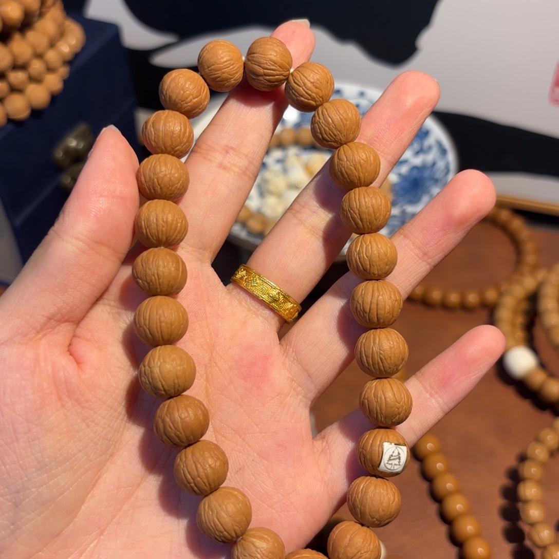 无***e猴头核桃手串原皮凤羽