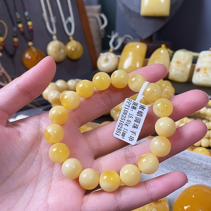 琥珀未镶嵌裸石圆珠手串