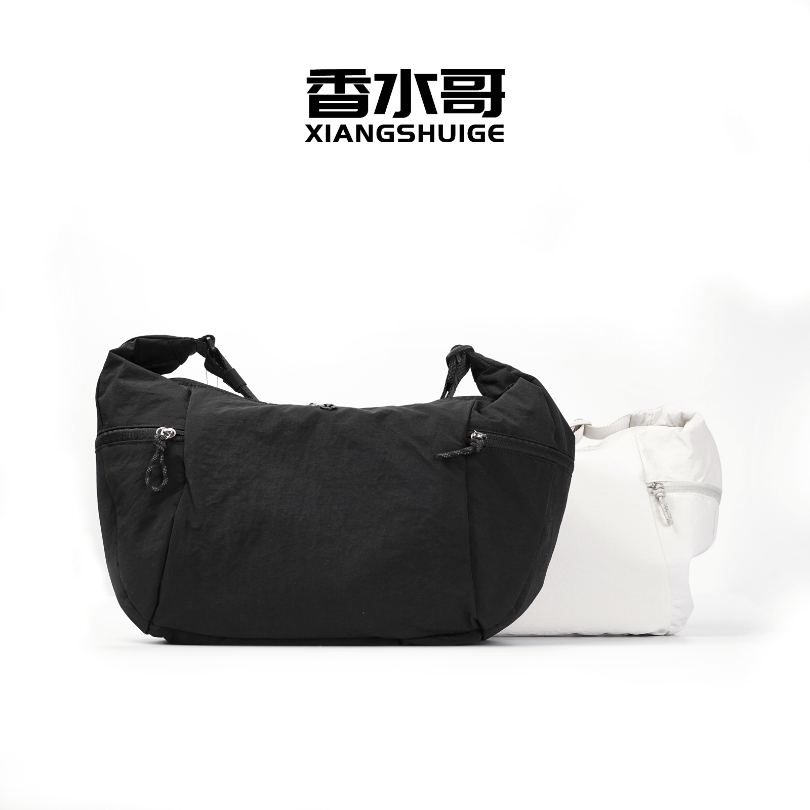 黑白色手提包2025新品时尚休闲包包运动弯刀单肩包