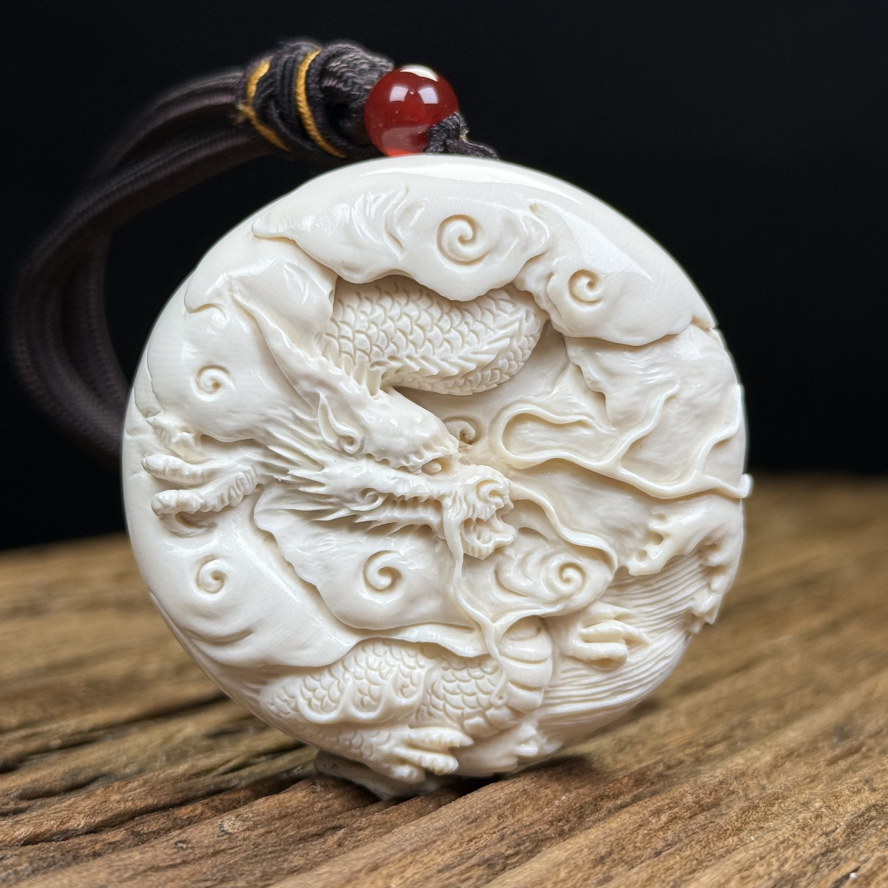 H2548天然猛犸牙雕刻龙饼51x16mm约51克（小幼牙料）