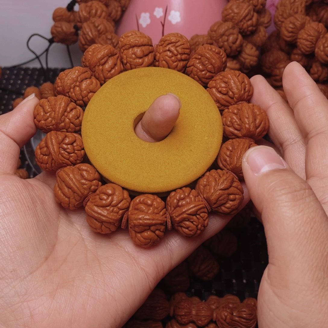 陈***成吊坠桃核桃核手串