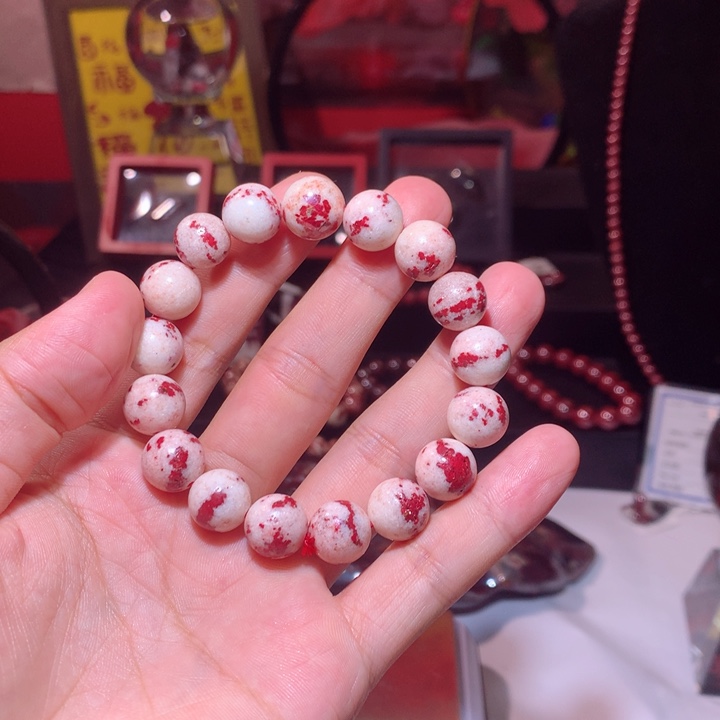 勇***士天然辰砂原石手串