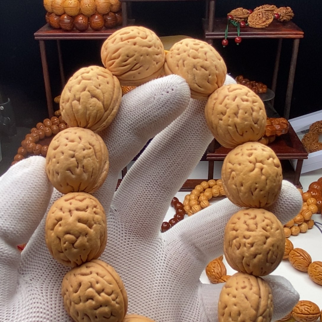 香榧木桃核钱袋子手串