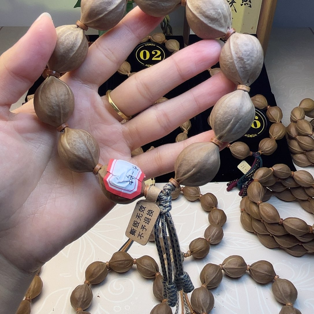 子***洋橄榄核手串梅林铁核20/26