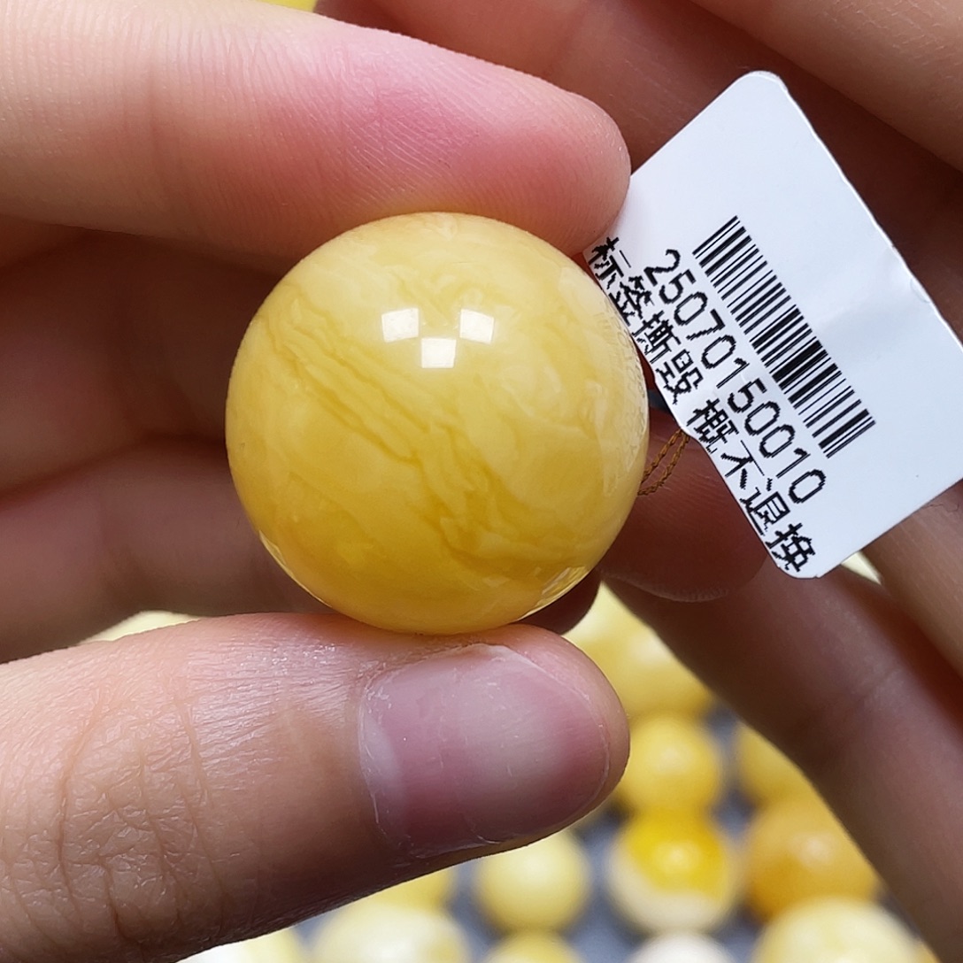 @***芳蜜蜡未镶嵌裸石23.3mm.瑕