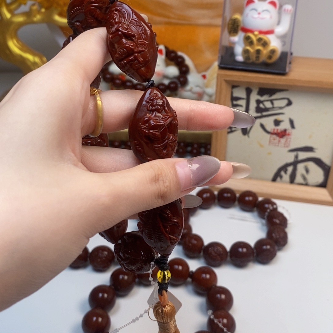 橄榄核吊坠追**乐橄榄。