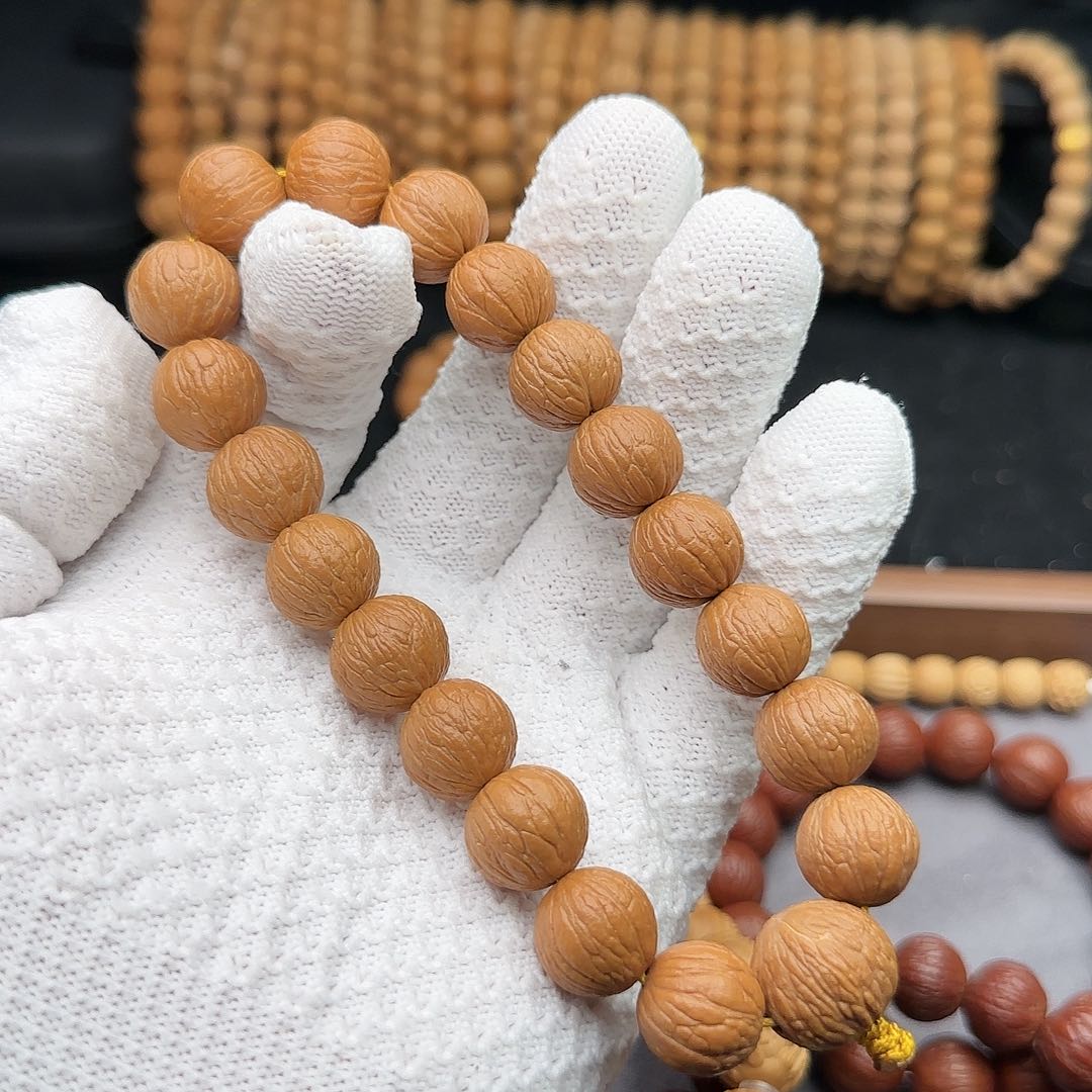 猴头核桃吊坠凤羽手持