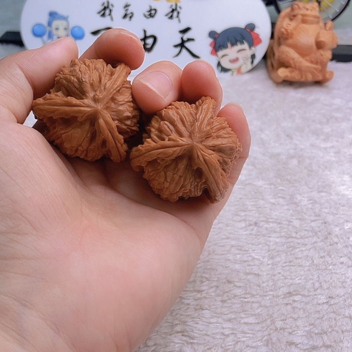 文玩核桃把件咋***呢三棱